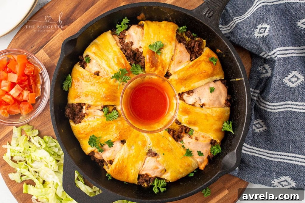 Taco Bell's Gordita Ring 7 A delicious Taco Bell Gordita Ring with a crescent twist! It's loaded with layers of seasoned meat, crispy taco shell pieces, and cheese.