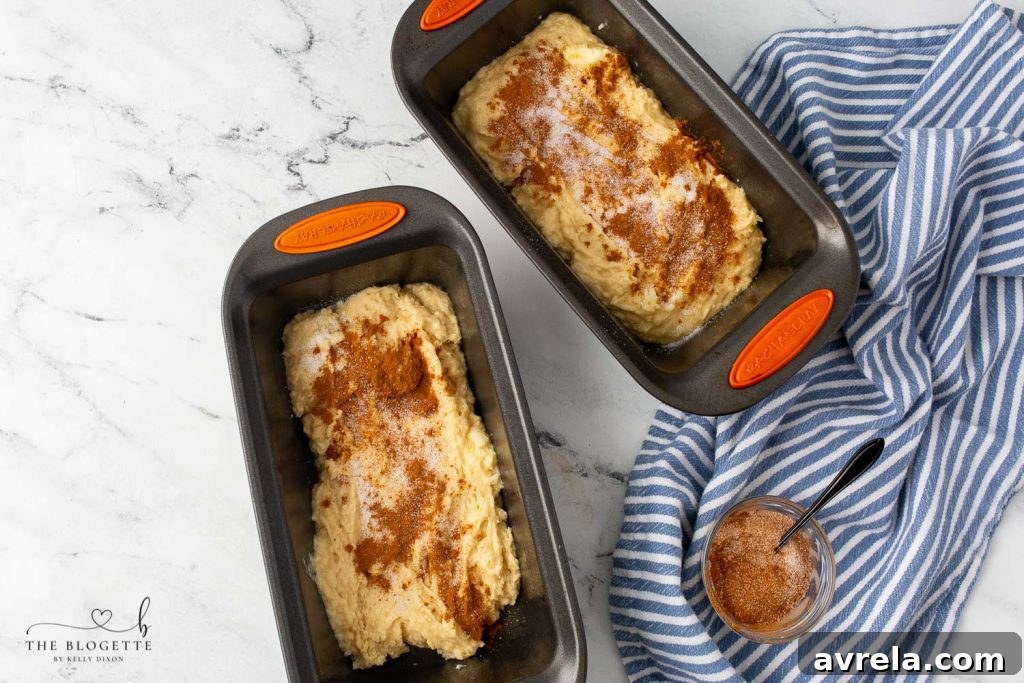 Butter and sugar being creamed together in a stand mixer for Amish Cinnamon Bread