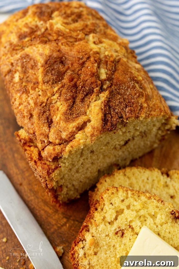 Freshly baked Amish Cinnamon Bread cooling on a wire rack, ready to be enjoyed