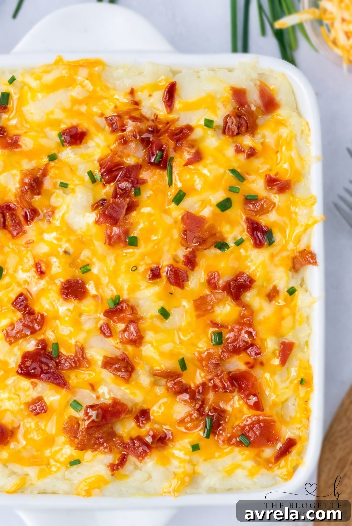 Loaded Potato Meatloaf Casserole covered with aluminum foil, baking in the oven to achieve perfectly moist meatloaf.