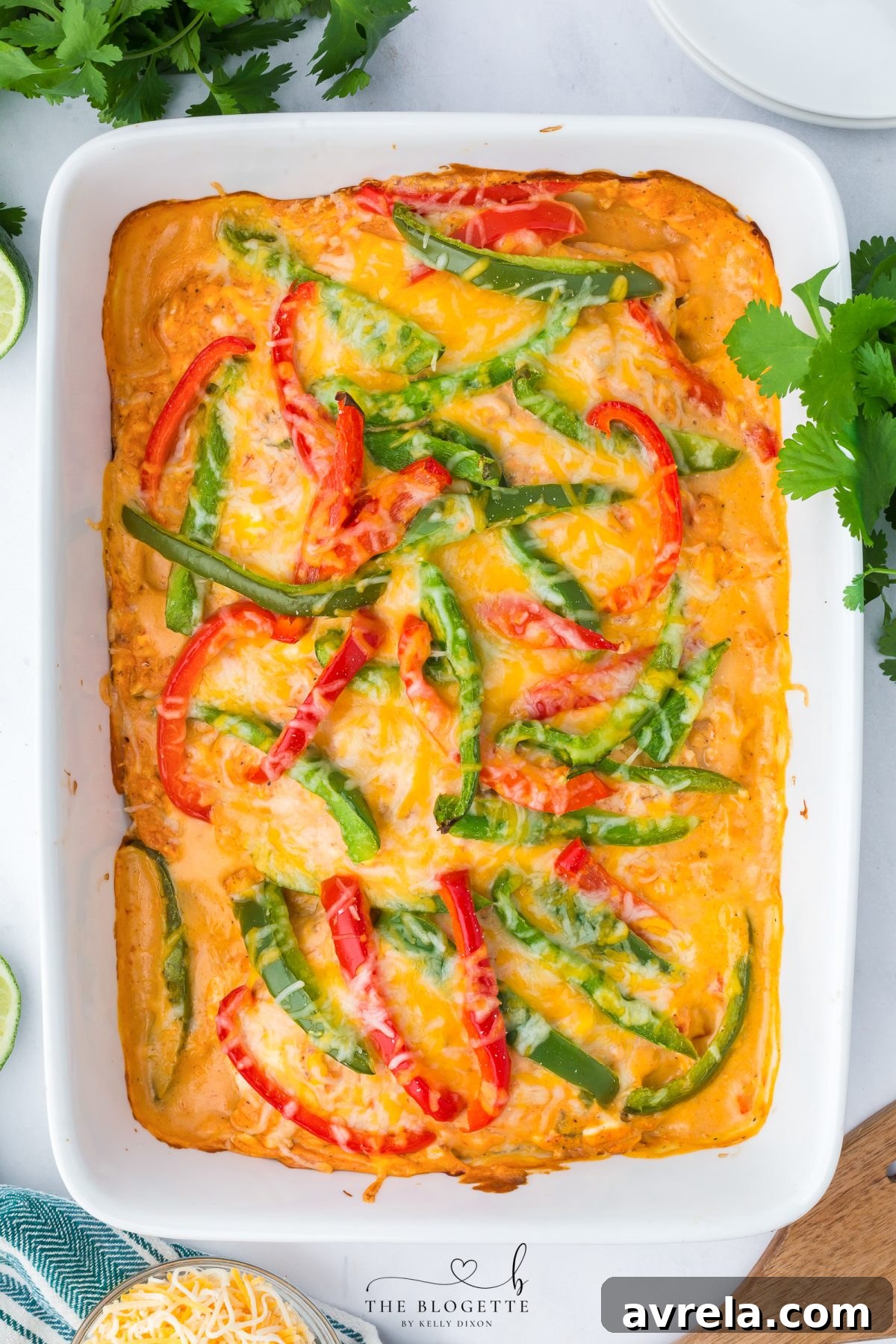 A freshly baked chicken fajita casserole with melted cheese and bell peppers, ready to serve.