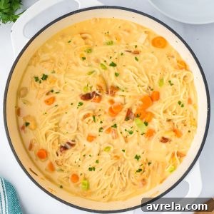 Simmer uncovered, rich and creamy Crack Chicken Soup in a large pot