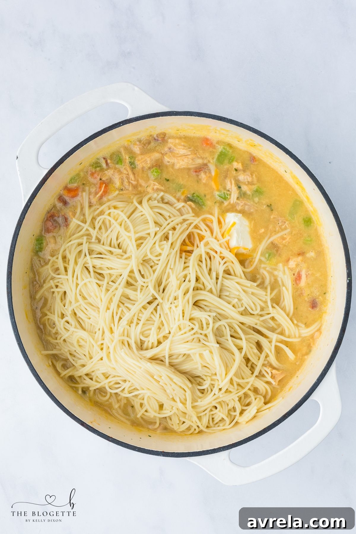 Adding angel hair pasta to the Crack Chicken Soup