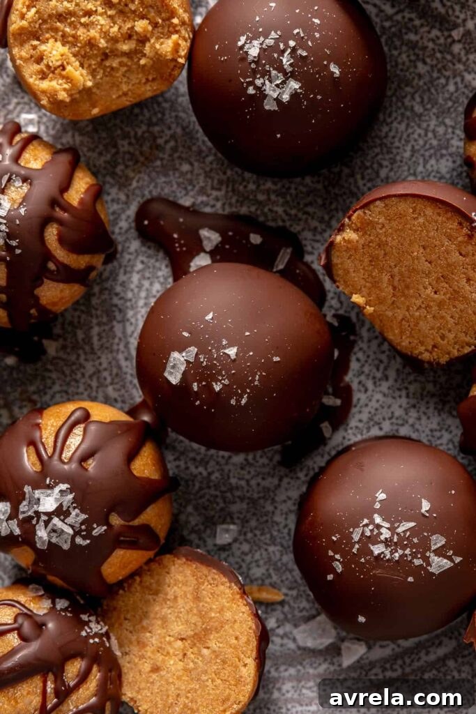 peanut butter balls with chocolate drizzle