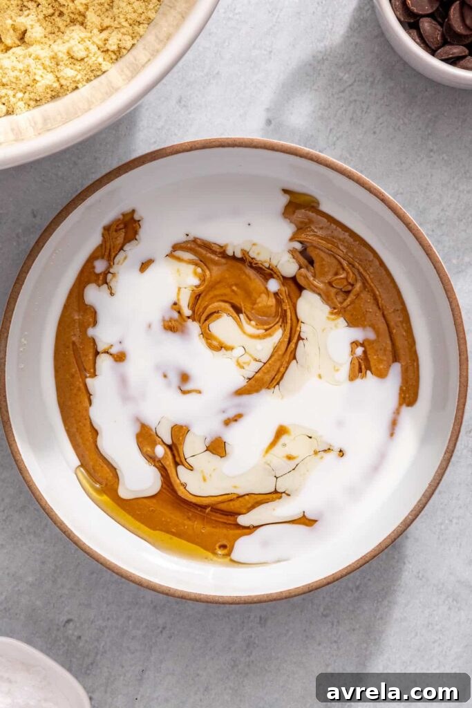 Smooth peanut butter and honey mixture in small bowl