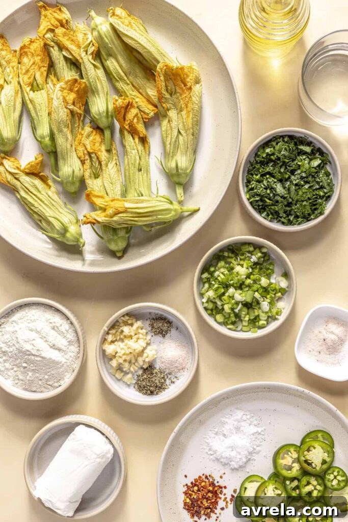Zucchini blossoms frying in a skillet