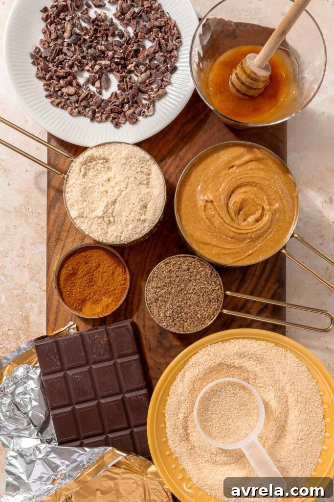 Ingredients for peanut butter chocolate chip protein balls including almond flour and flaxseed