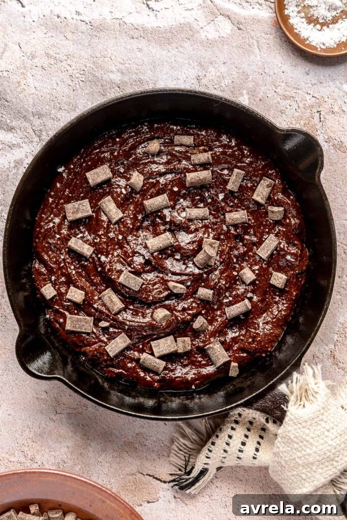 Chocolate Tahini Skillet Cookies: Gooey One-Pan Dessert 11 Finished skillet with berries