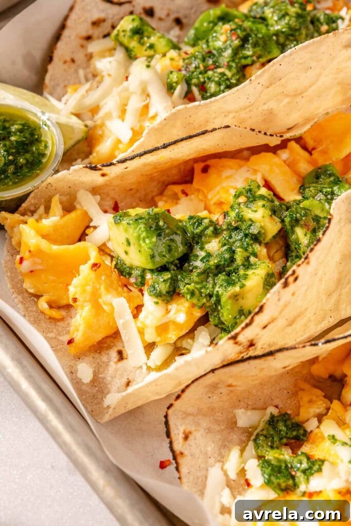 Avocado Chimichurri Breakfast Tacos with Lime Crema 15 Close-up chimichurri drizzle