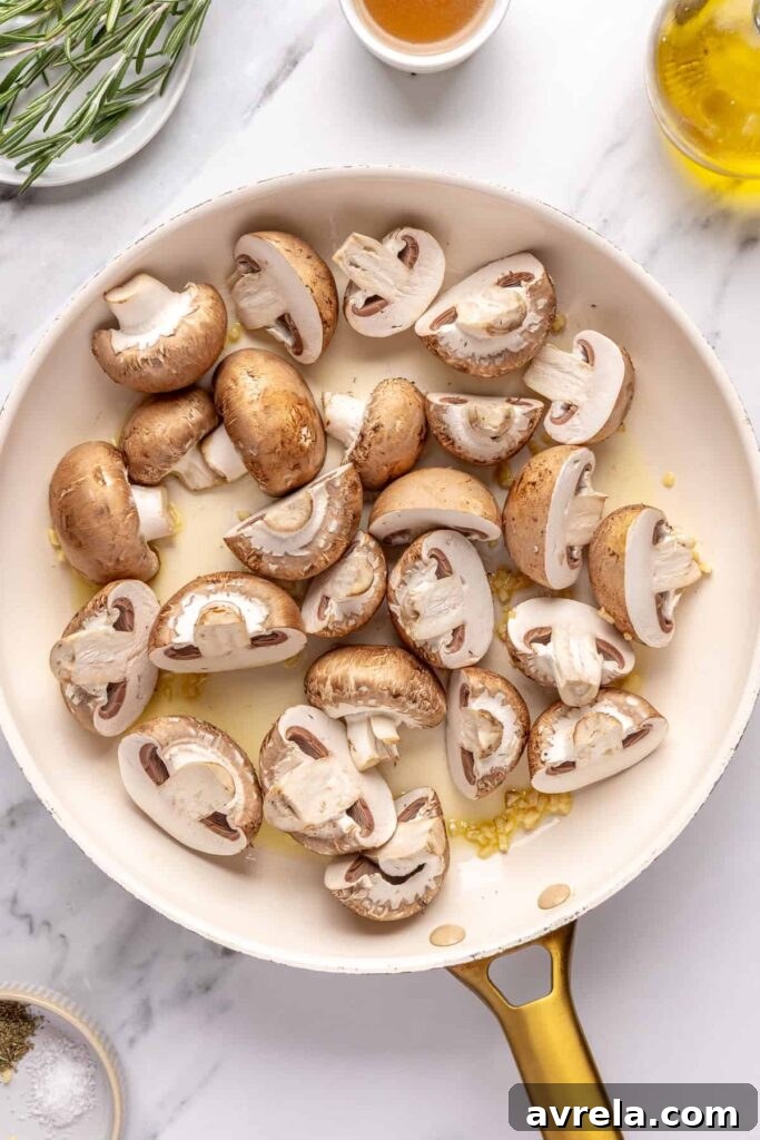 Garlicky mushrooms ready to be cooked in ghee and olive oil