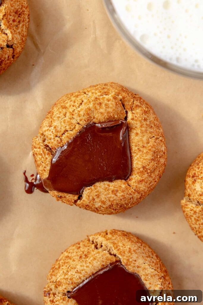 healthy peanut butter blossoms with chocolate center