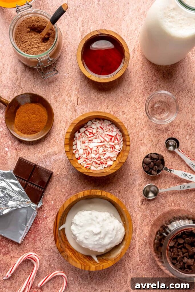 Hot cocoa with whipped cream and candy cane