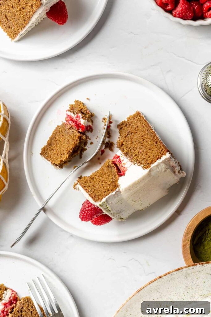 Gluten-Free Vanilla Cake with Matcha and Lemon Zest 18 Slice of gluten-free vanilla cake with matcha & lemon showcasing its moist and airy texture.