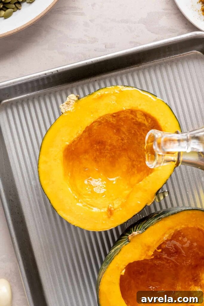Kabocha cashew curry soup served with pumpkin seed topping – gluten-free, dairy-free recipe