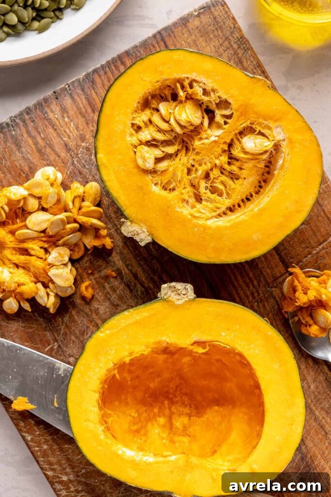 Kabocha cashew curry soup served with pumpkin seed topping – gluten-free, dairy-free recipe