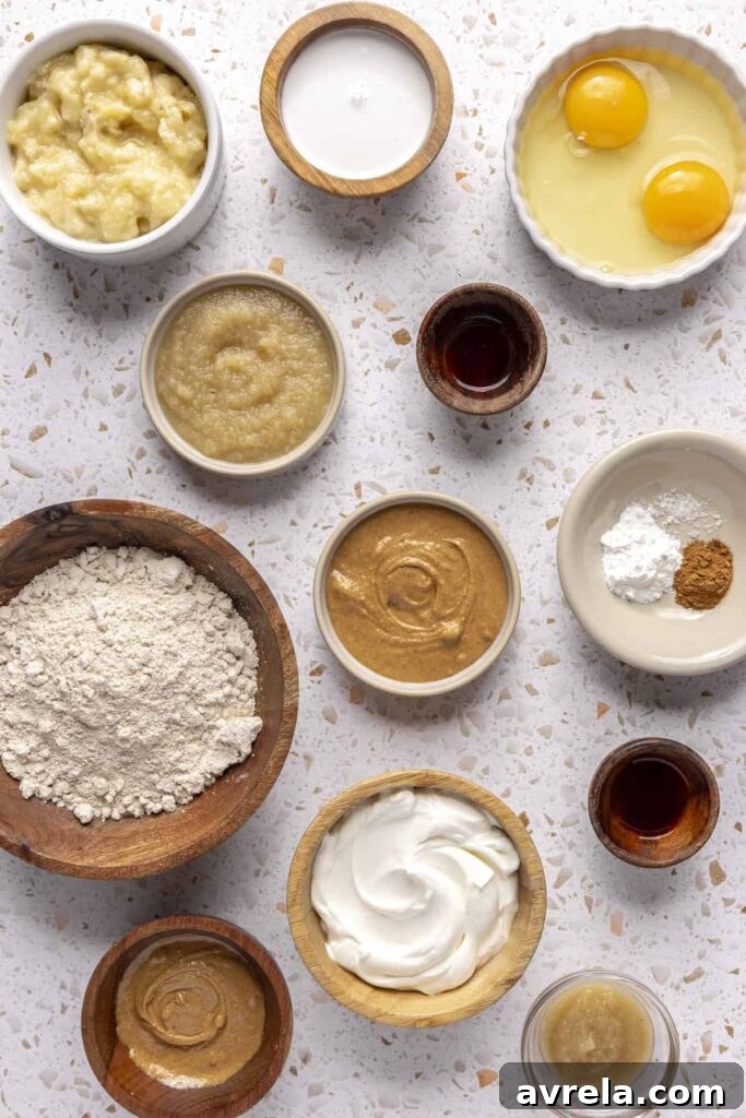 Ingredients for healthy smash cake including banana, oat flour, and applesauce