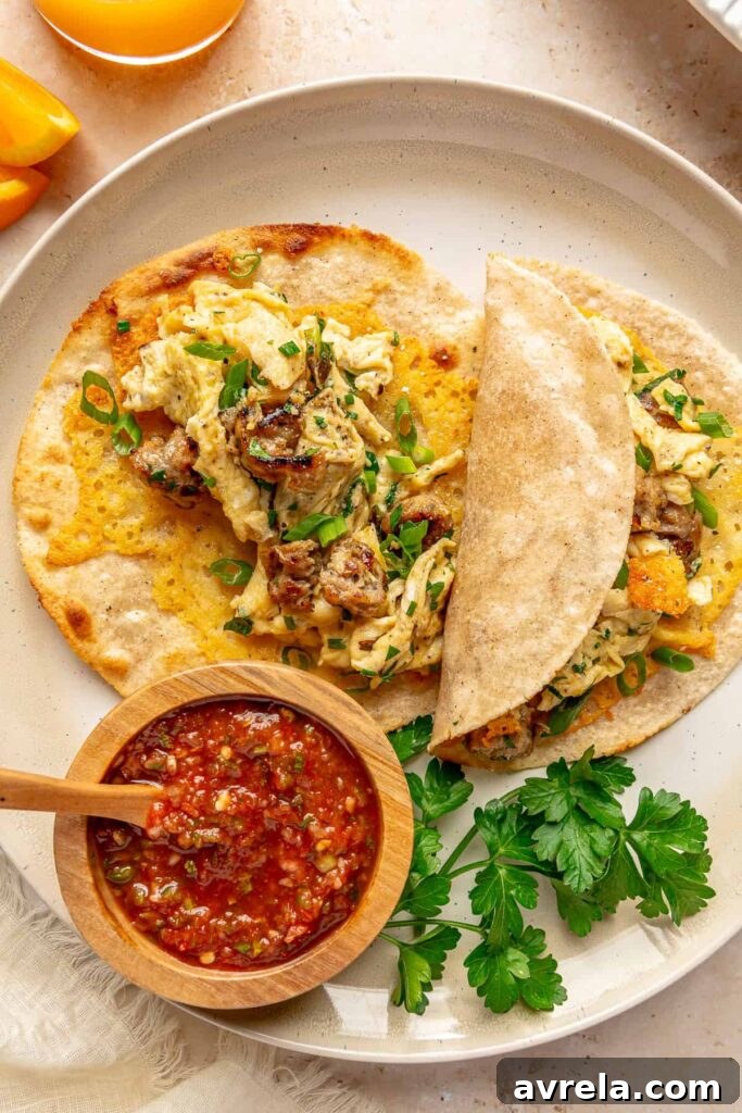 6 Delicious Egg Breakfast Recipes to Start Your Morning 3 Egg, sausage and crispy cheese breakfast tacos