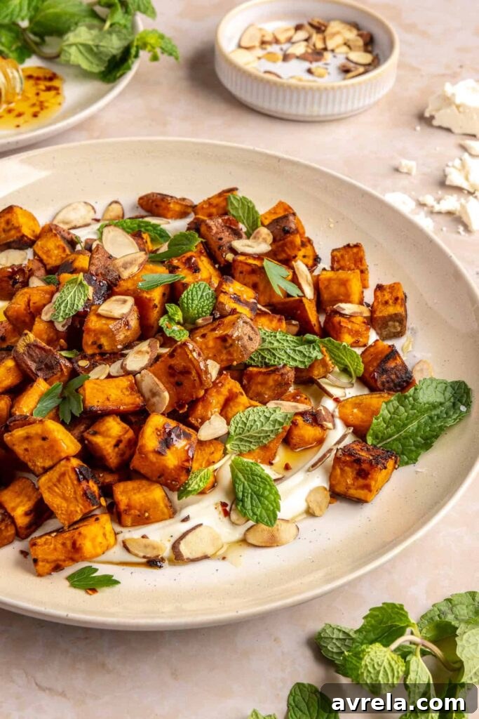 Maple-Roasted Sweet Potatoes with Whipped Feta and Hot Honey 18 Plated roasted sweet potatoes over creamy whipped feta topped with hot honey, and fresh herbs