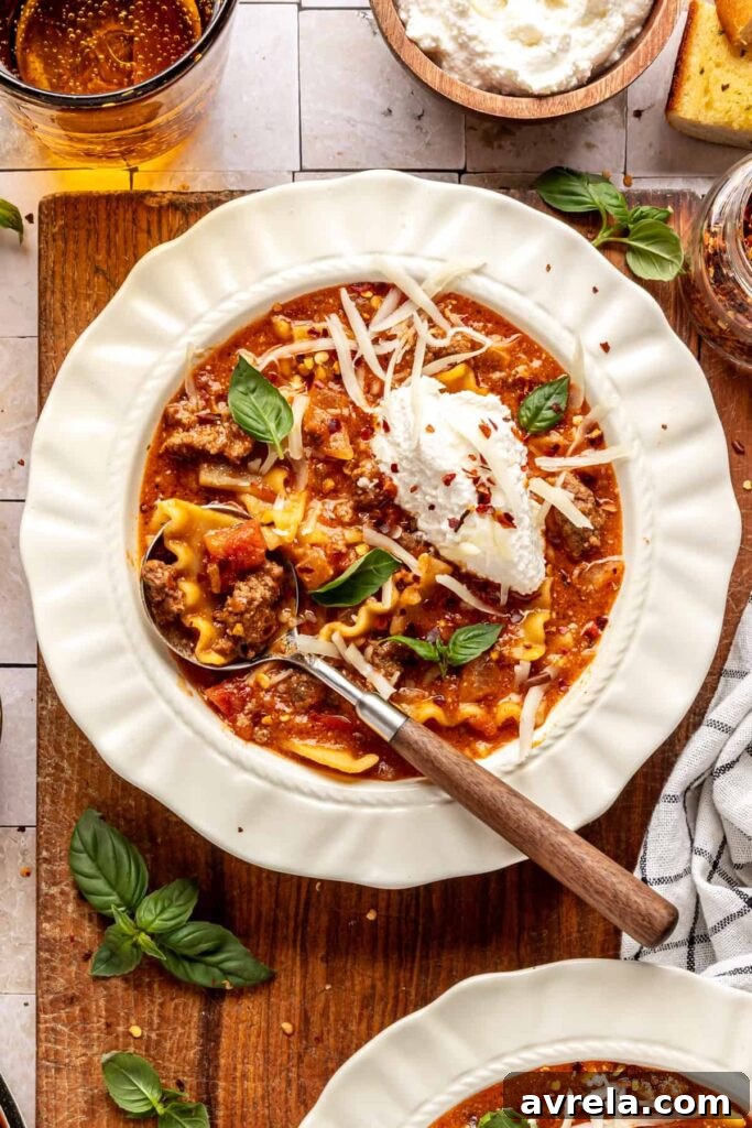 High-Protein Lasagna Soup Recipe — Easy, Hearty & Protein-Packed 14 High-protein lasagna soup in a bowl topped with dairy-free ricotta, basil, and chili flakes