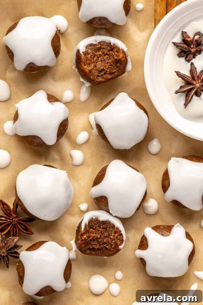 close up of chewy gingerbread protein balls with coconut butter drizzle, perfect for holiday snacks or meal prep