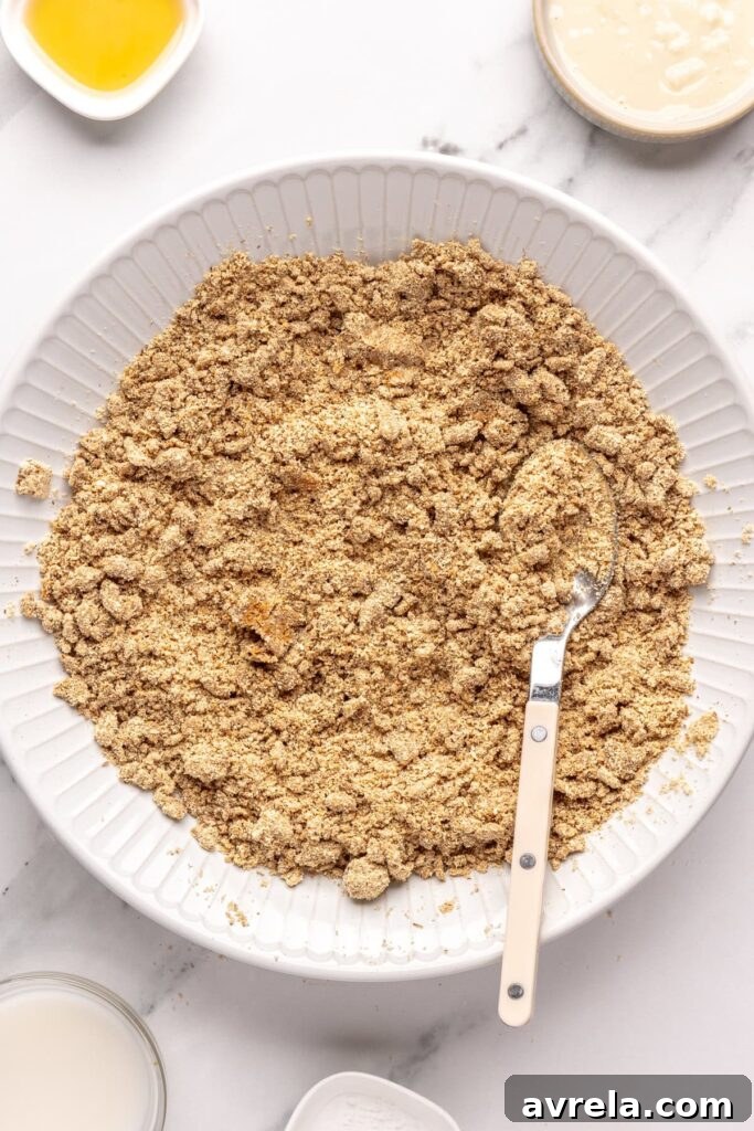 Forming gingerbread protein balls dough by combining wet and dry ingredients