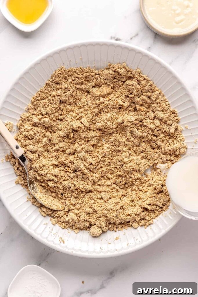 Forming gingerbread protein balls dough by combining wet and dry ingredients