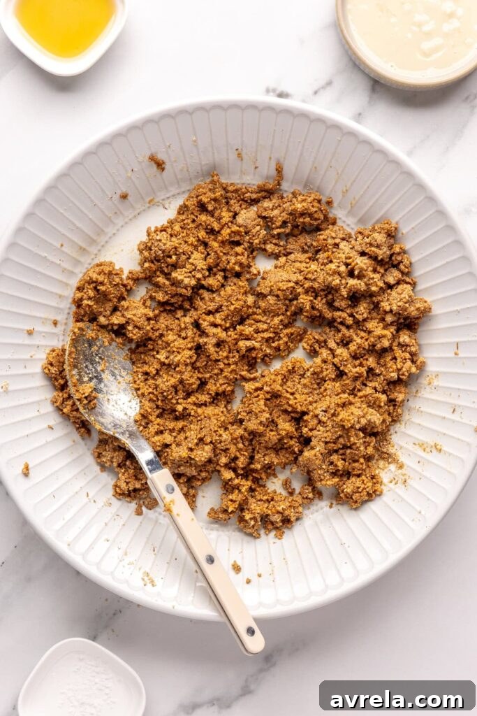 Forming gingerbread protein balls dough by combining wet and dry ingredients
