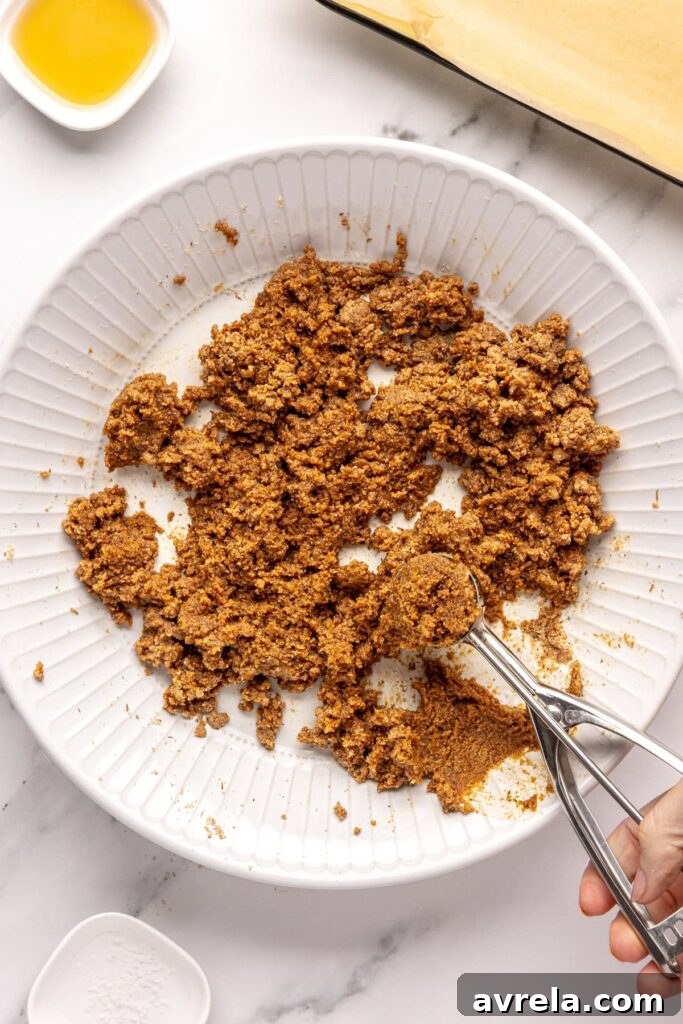 Forming gingerbread protein balls dough by combining wet and dry ingredients