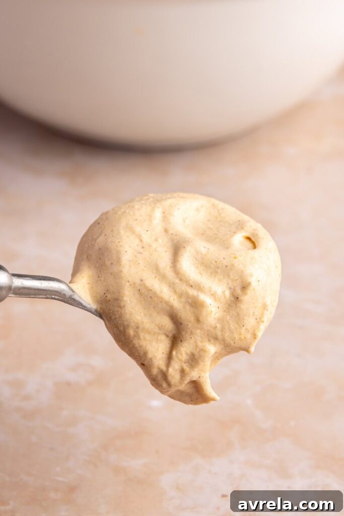 close-up of a spoonful of homemade pumpkin pie cold foam
