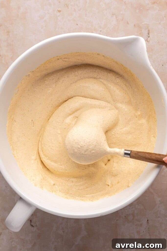 Homemade pumpkin cold foam in a bowl ready to top iced coffee