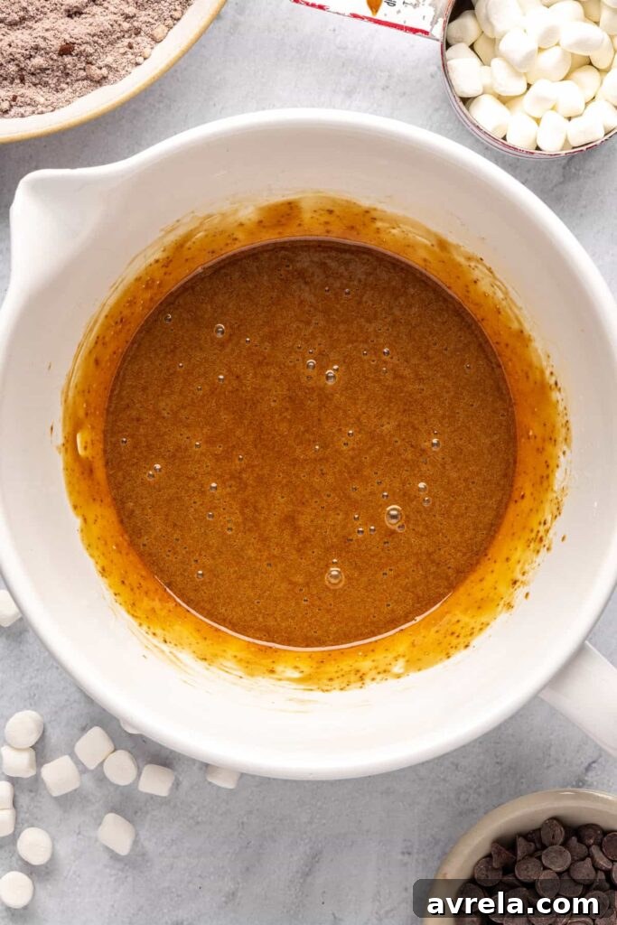 Wet ingredients blended smoothly for hot cocoa cookie dough