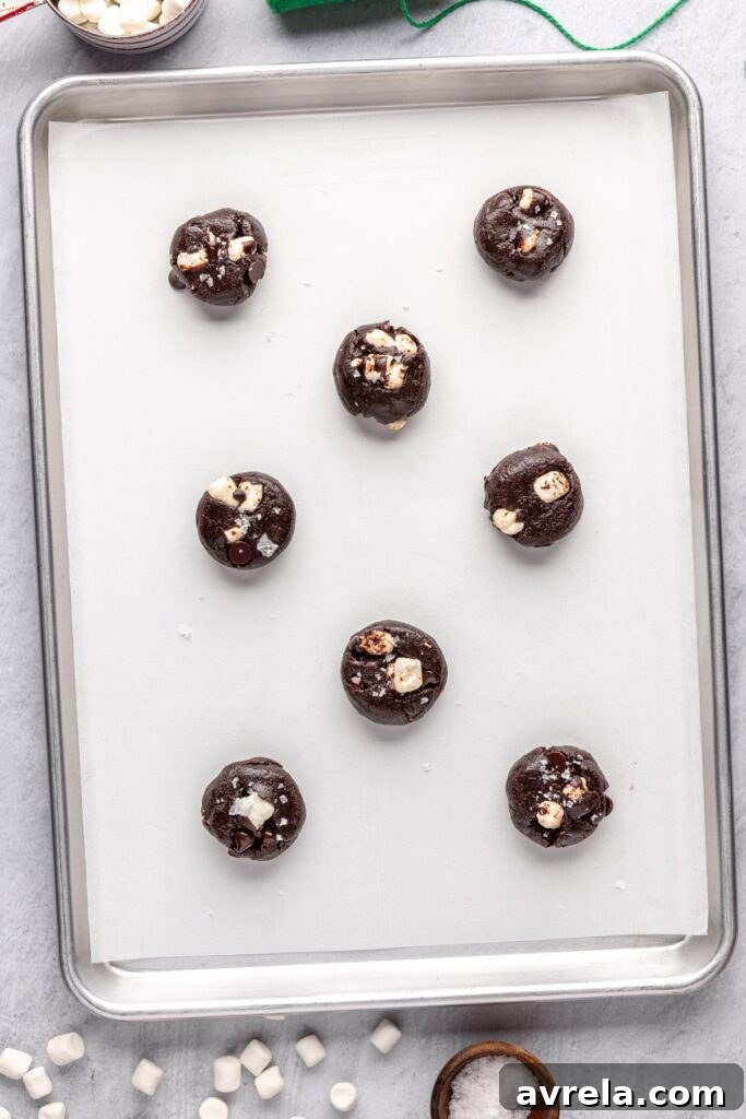 Hot cocoa cookie dough balls ready to bake