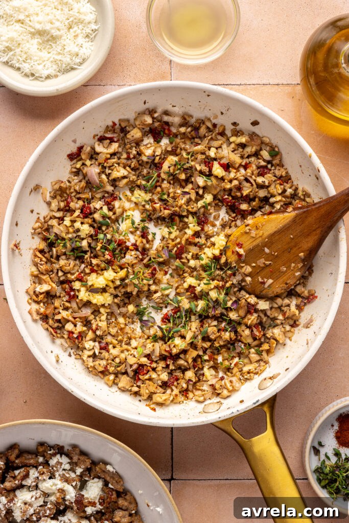 Mixing ingredients for mushroom stuffed with goat cheese