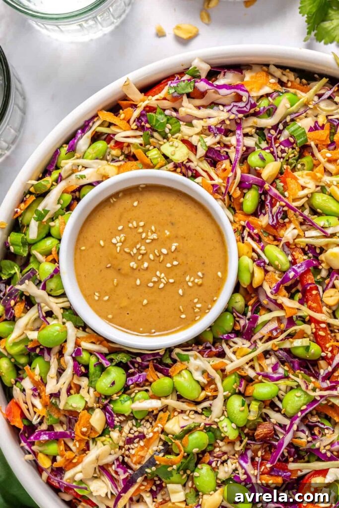 Close-up of crunchy peanut cabbage salad with shredded cabbage, carrots, and peanuts