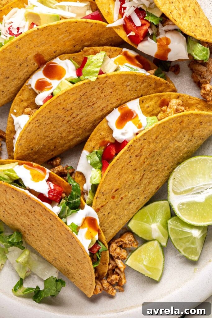 10 Easy No-Cook or Low-Effort Dinners for Nights You Don't Feel Like Cooking 3 Close-up of crunchy turkey tacos filled with seasoned ground turkey and fresh toppings