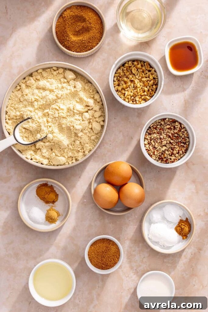 Overhead shot of ingredients needed to make gluten-free coffee cake muffins with almond flour and coconut sugar