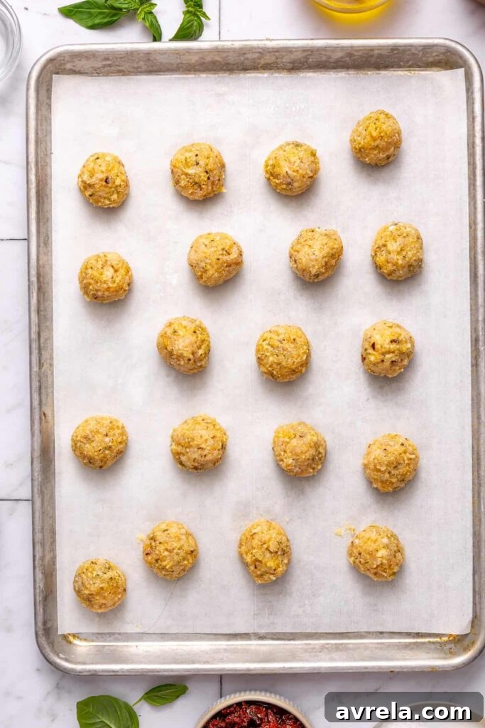 marry me chicken meatballs on baking pan before transferring to skillet