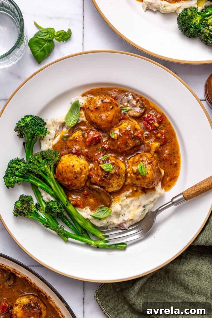 Cozy dinner table with creamy chicken meatballs meal