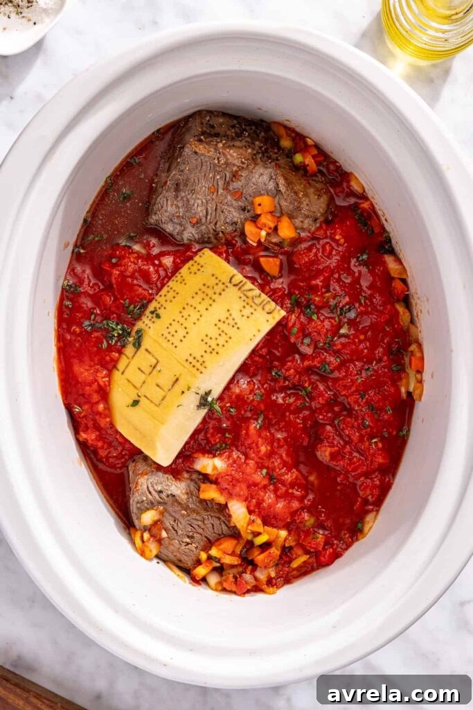 Ingredients added to slow cooker for short rib ragu before cooking