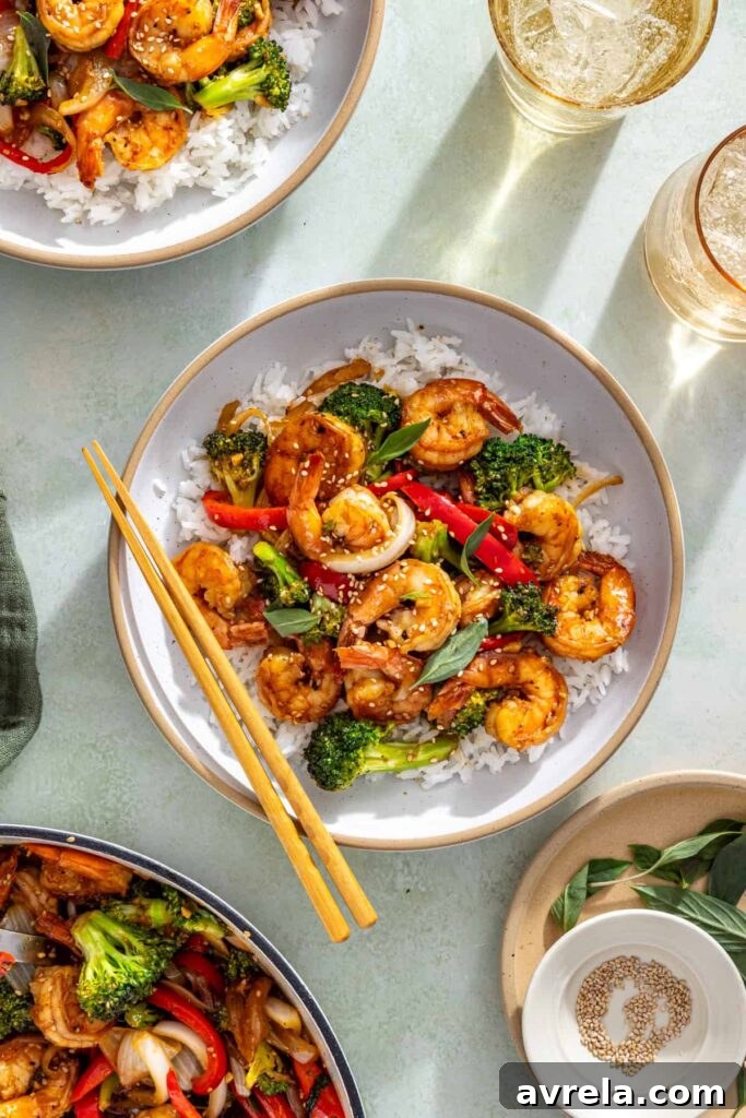 overhead view of styled table with easy shrimp stir fry and chopsticks