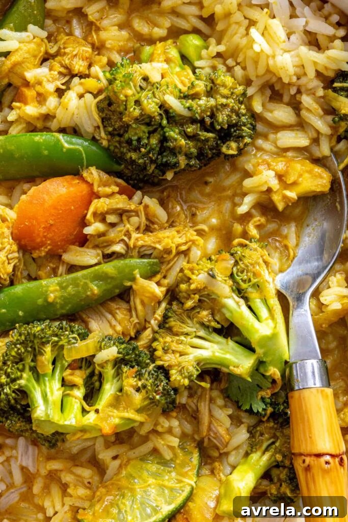 Slow Cooker Coconut Chicken Curry Recipe for Tender, Flavorful Meals 3 detailed shot of crockpot chicken curry with vegetables and herbs
