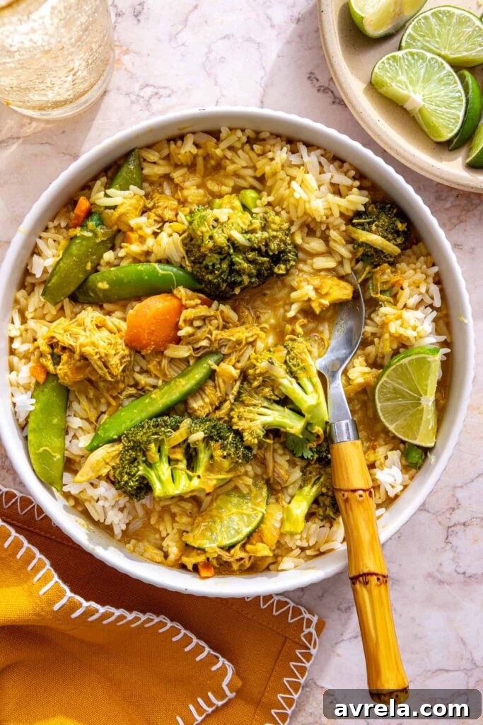 Slow Cooker Coconut Chicken Curry Recipe for Tender, Flavorful Meals 18 crockpot chicken curry ready to serve on styled table