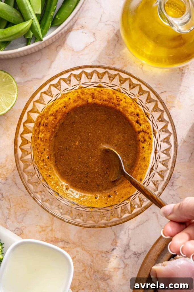Slow Cooker Coconut Chicken Curry Recipe for Tender, Flavorful Meals 9 spice blend being mixed into paste for crockpot chicken curry