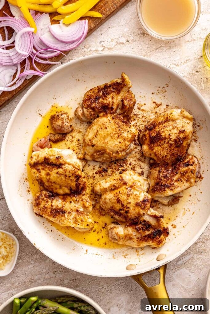 Wholesome Chicken Thigh Rice Bowls 9 Searing chicken thighs in a hot skillet to create a golden-brown crust