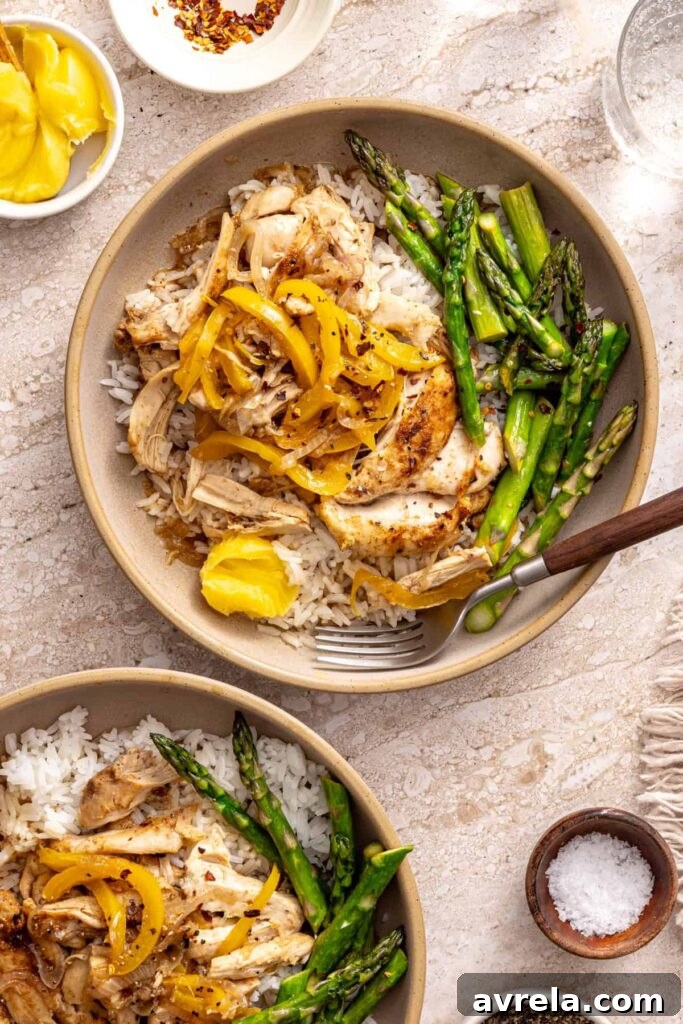 Healthy rice bowls with chicken and vegetables styled tabletop
