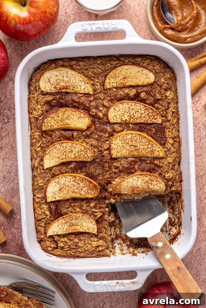 Golden baked apple oatmeal with cinnamon and caramel swirls