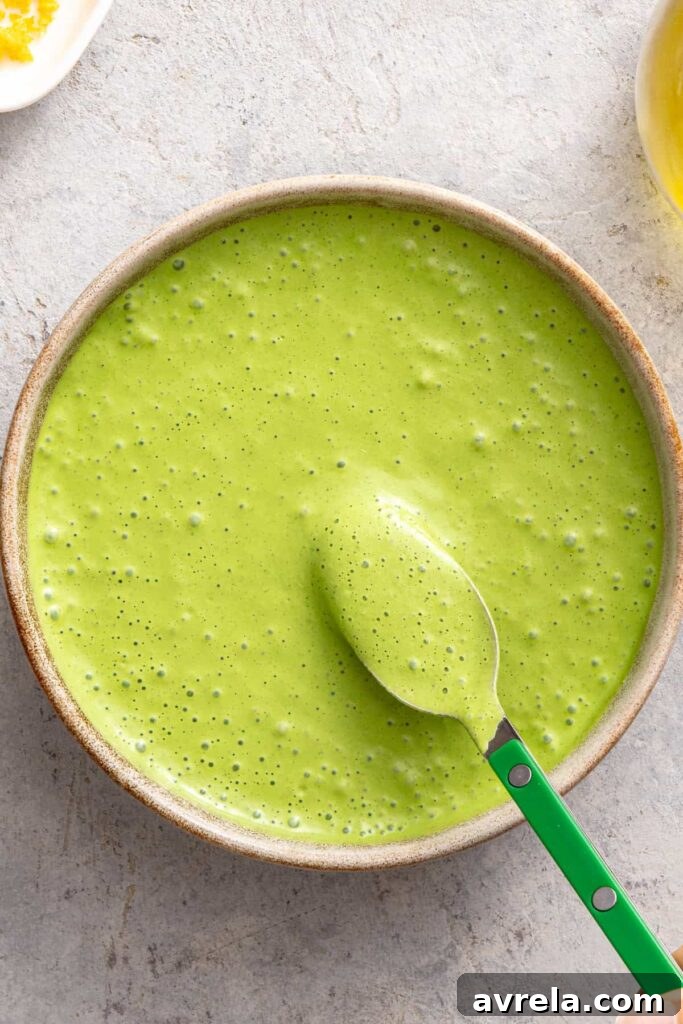 Homemade herb sauce for baked salmon and asparagus