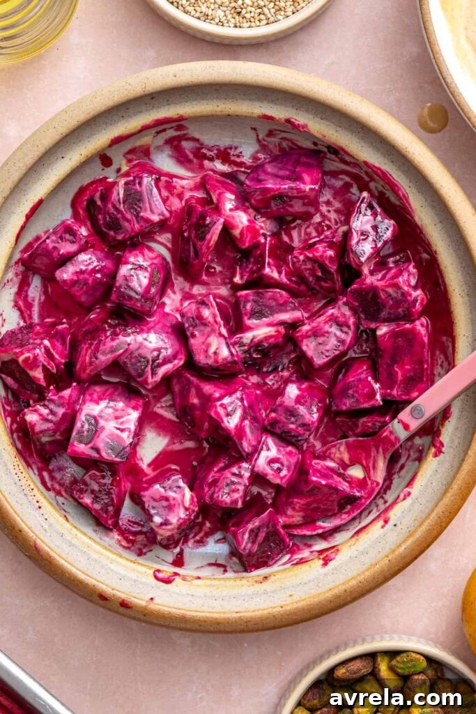 Roasted beets tossed in creamy tahini dressing