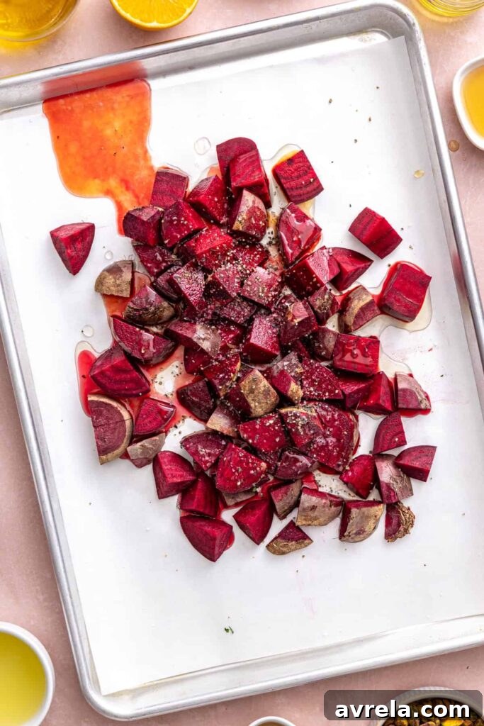 Chopped raw red beets cut into 1-inch pieces for roasted beet salad