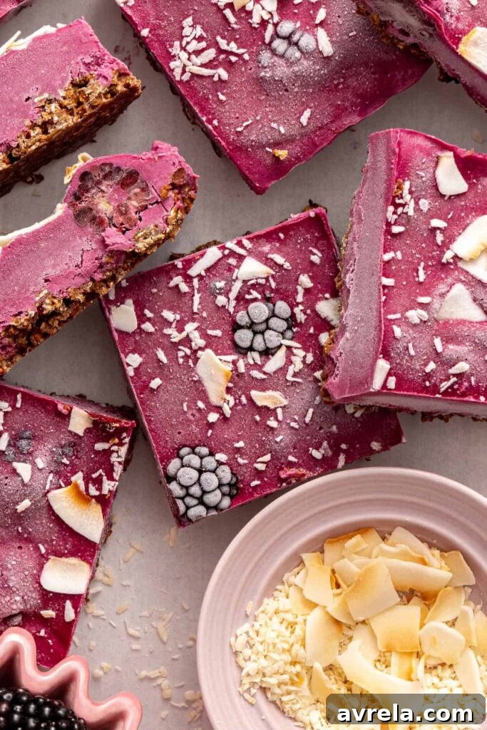 Top view of sliced blackberry cobbler bars showing layered texture